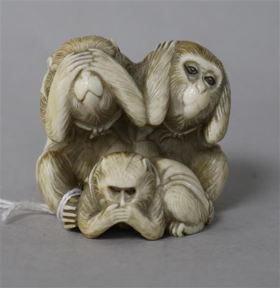 An ivory okimono monkey group